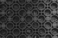 Geometric Patterned Grate with Litter Background