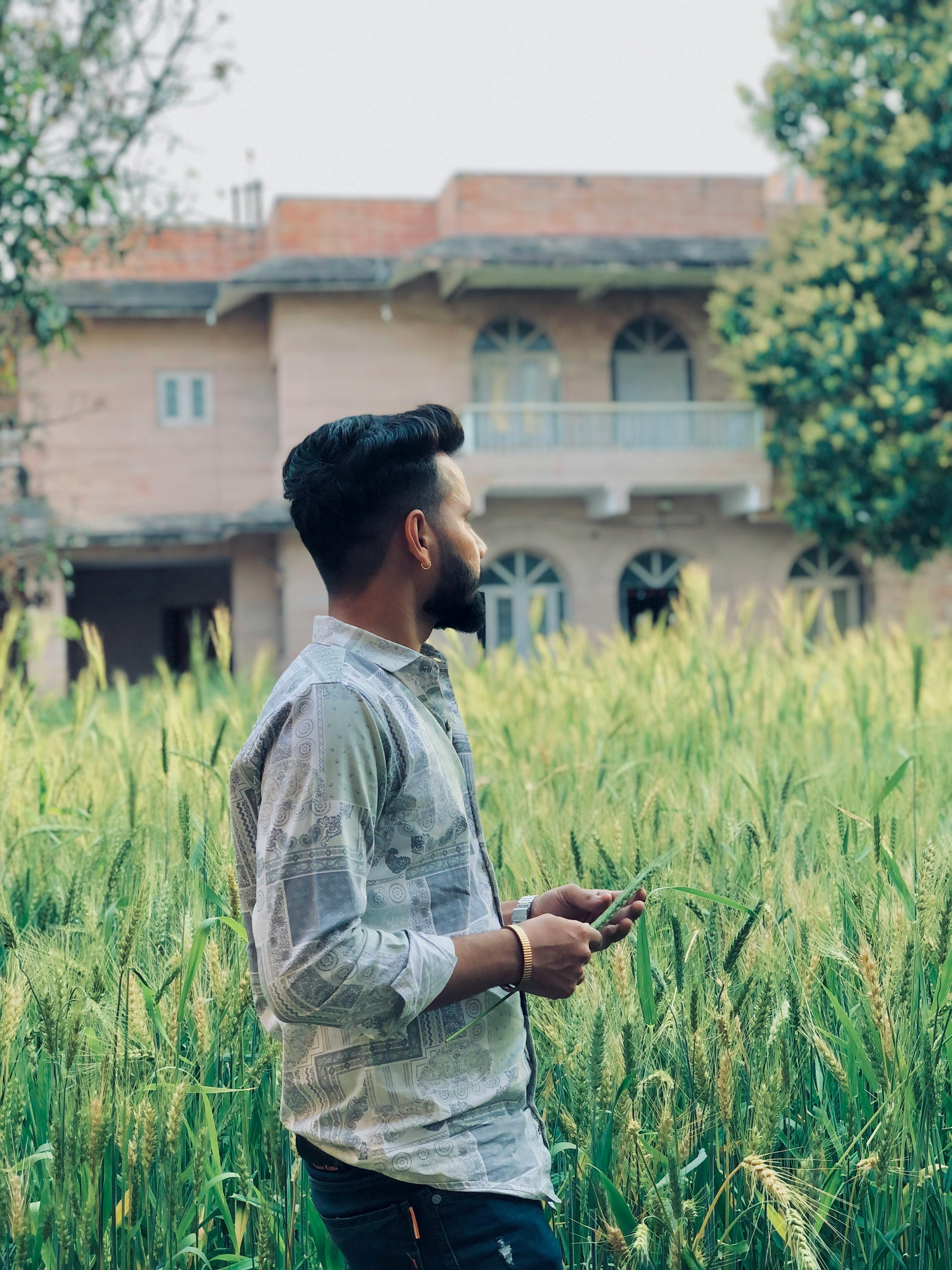 Farmer using a phone in field