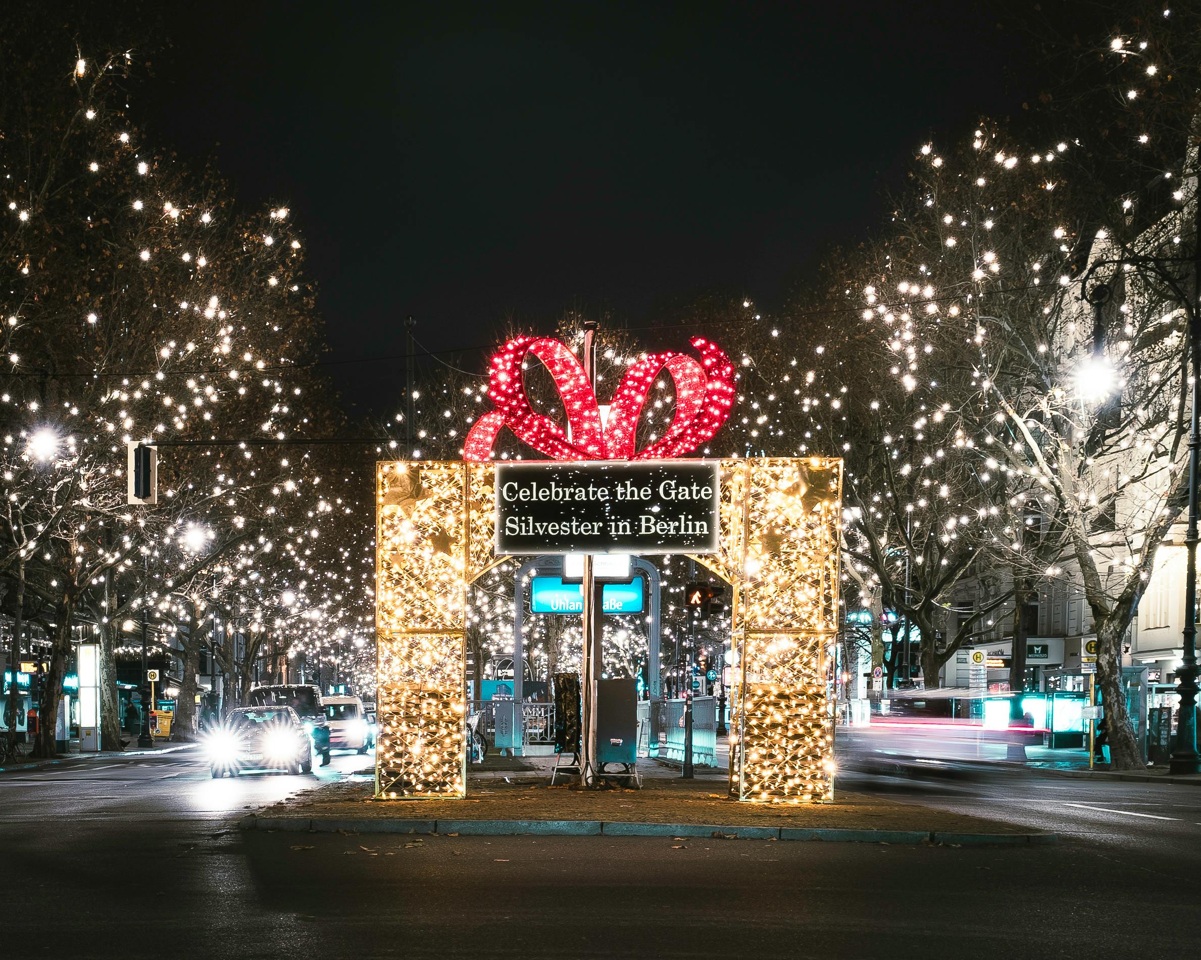 illuminated berlin street with christmas lights