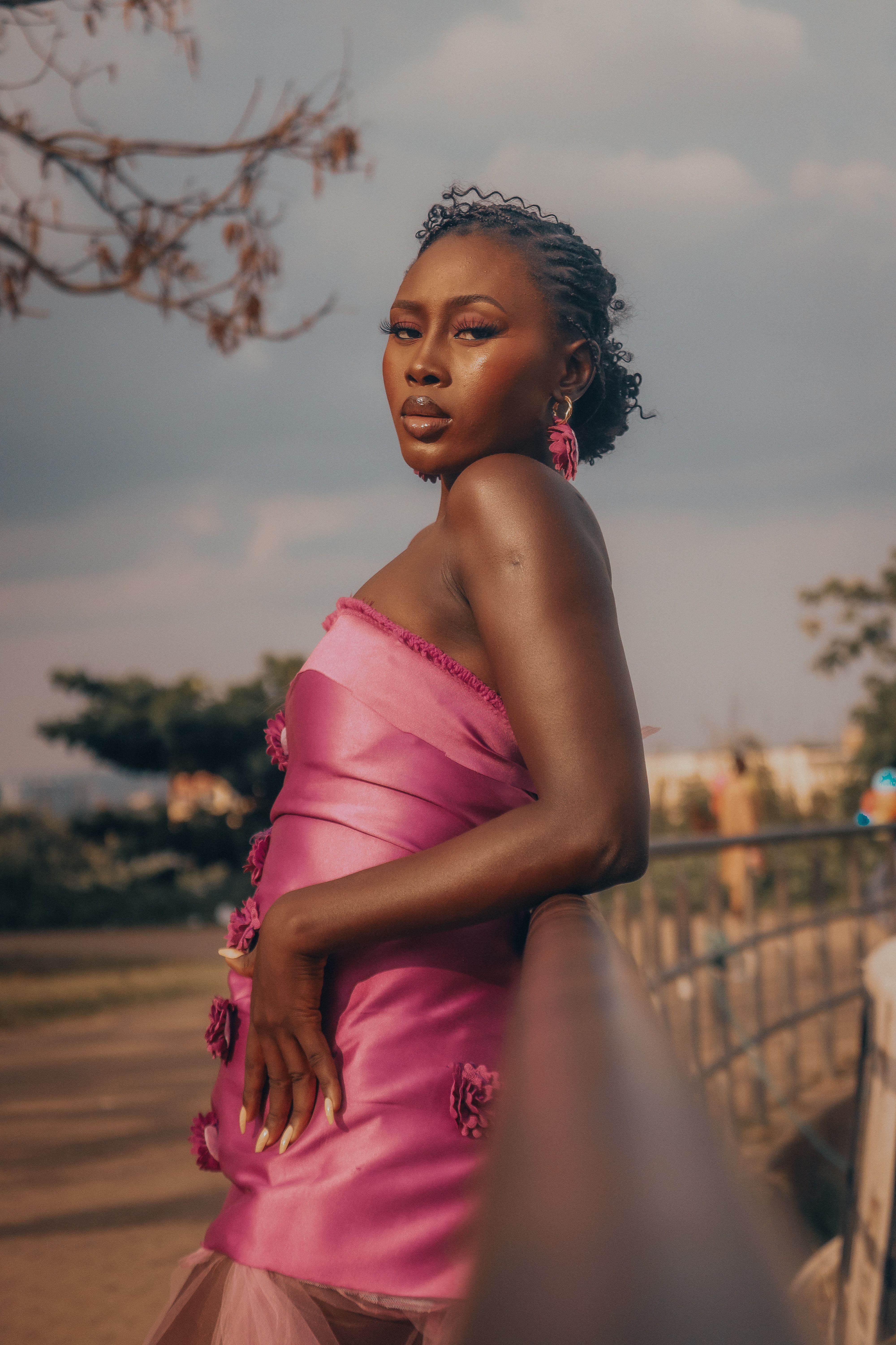 Elegant Woman in Pink Dress Outdoors · Free Stock Photo