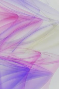 Abstract image of colorful pastel fabric waves in soft motion.