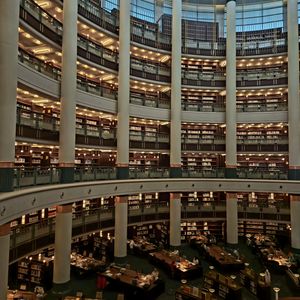 Tiered library bookshelves — photo by Ufuk Çakıroglu on Pexels