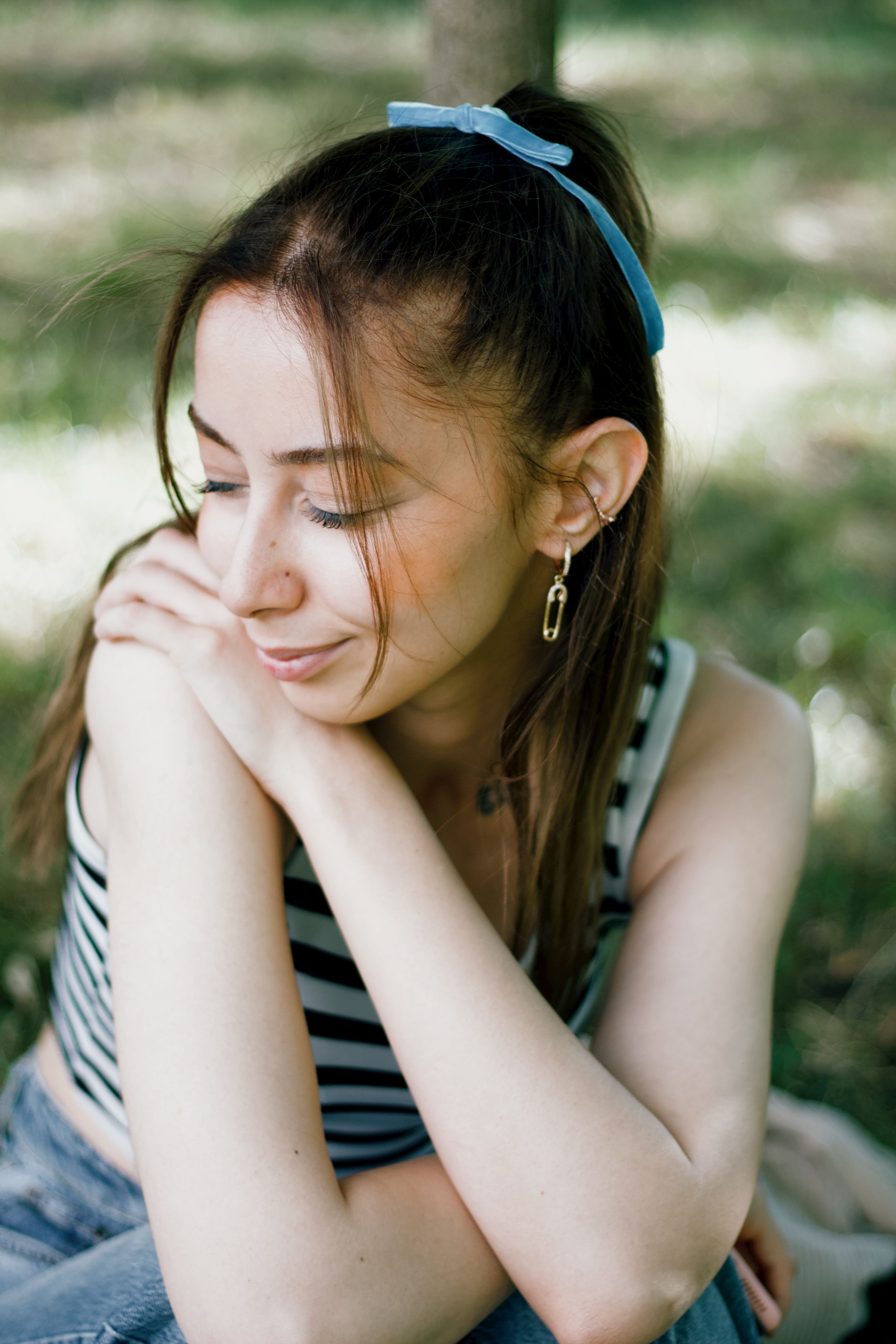 Peaceful Woman Relaxing Outdoors in Summer Sun · Free Stock Photo
