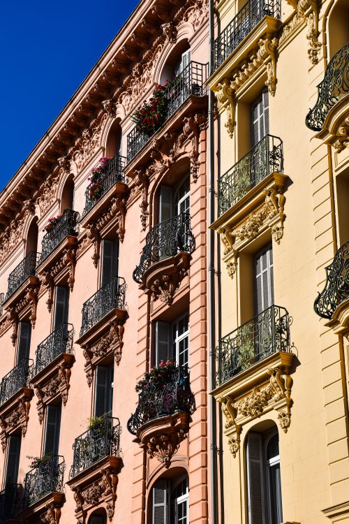 Free Ornate facades of historic buildings in Provence-Alpes-Côte d'Azur, capturing French architectural beauty. Stock Photo