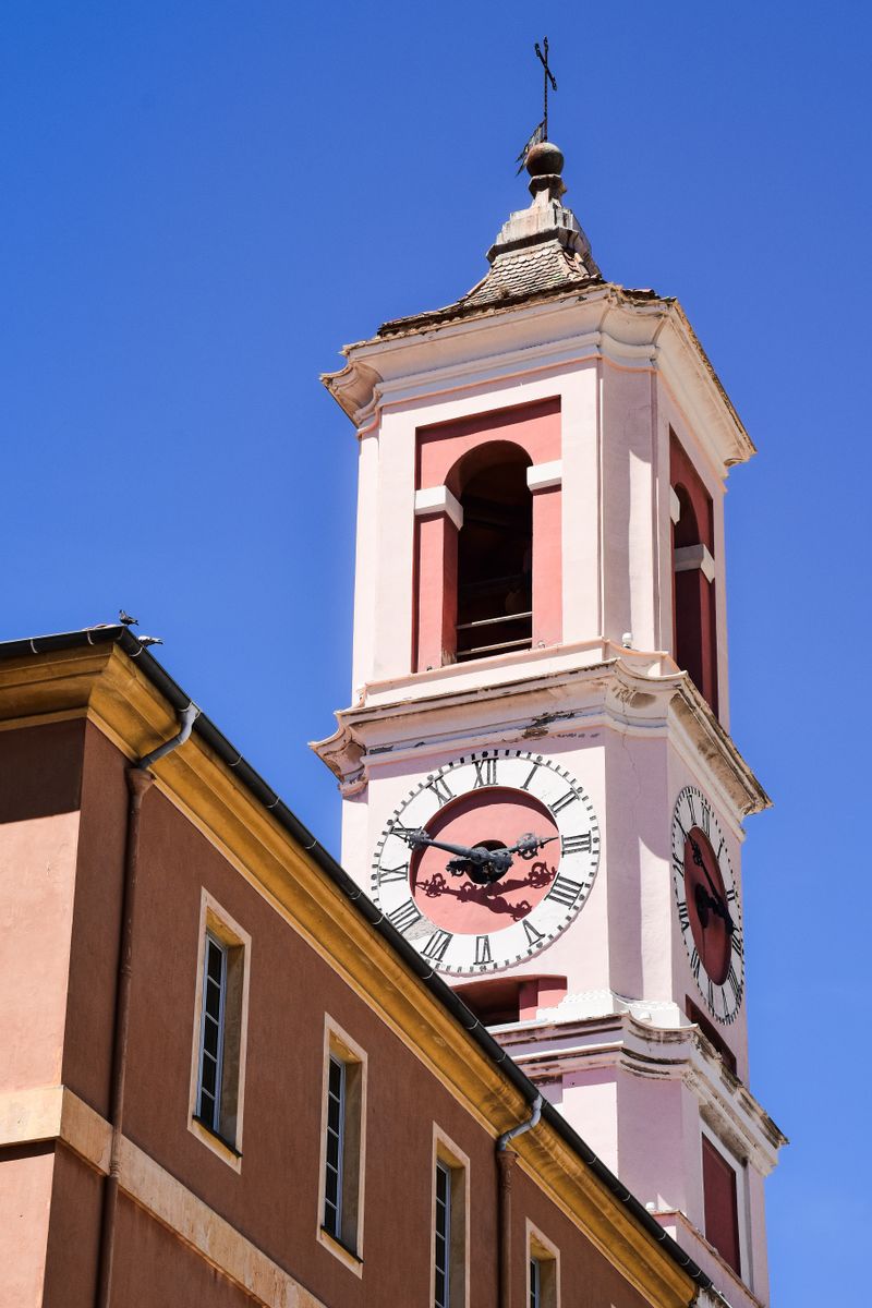 Clock tower of Old Town Nice against a blue sky