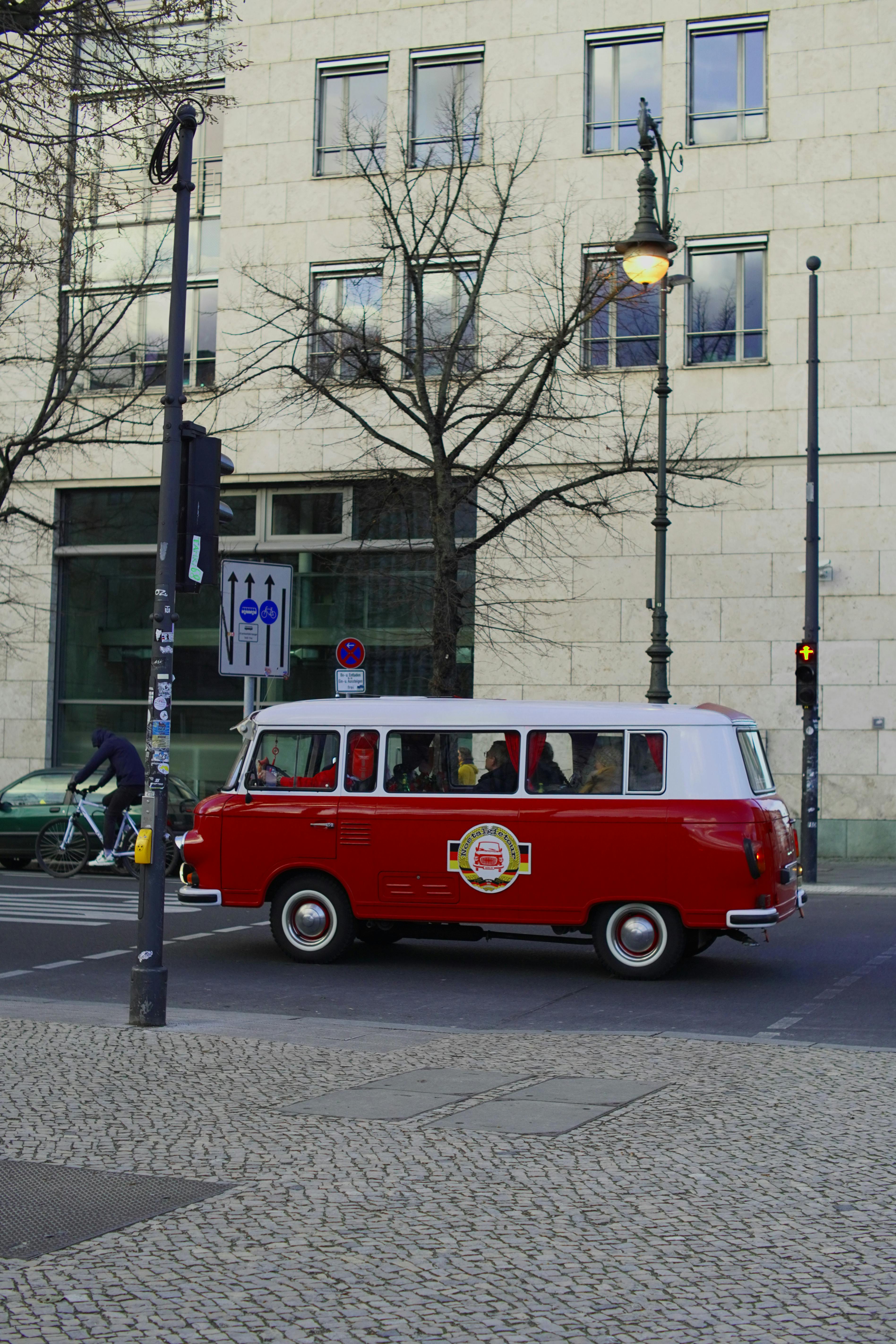 vintage red van on berlin street corner