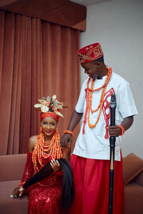 Free Couple in vibrant traditional Nigerian attire, showcasing cultural heritage. Stock Photo