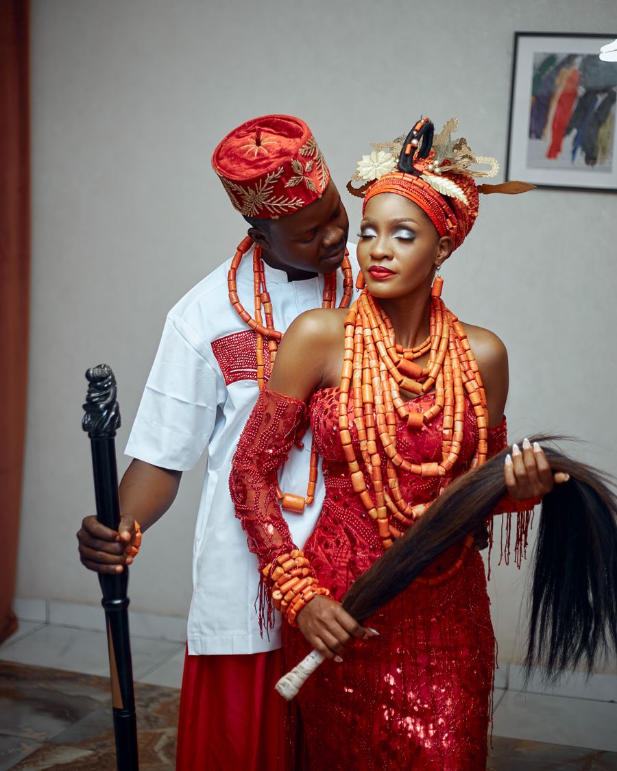 African couple in vibrant traditional wedding attire