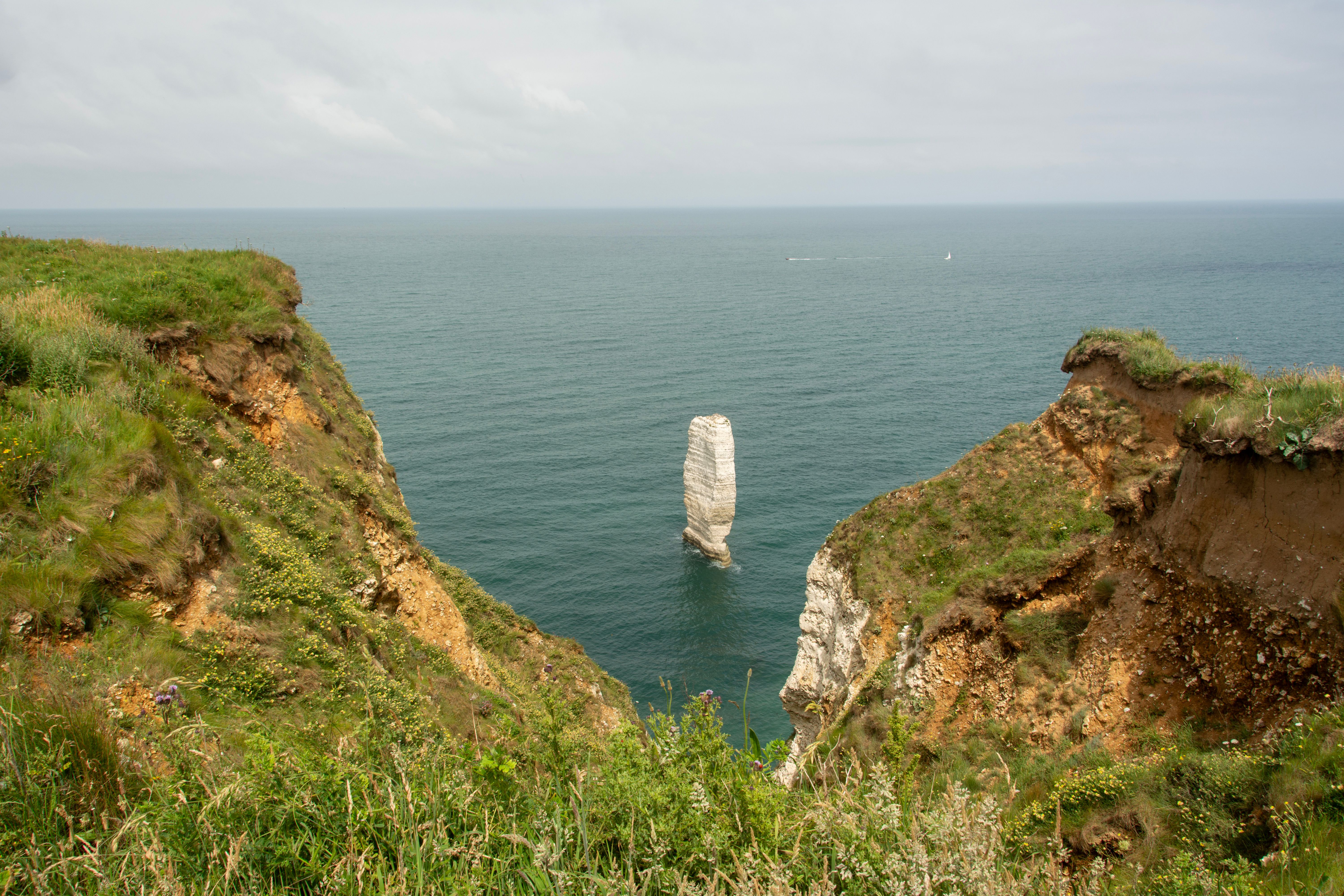 Scenic Coastal Cliff Overlooking the Sea · Free Stock Photo