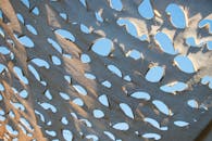 Patterned fabric canopy under clear sky