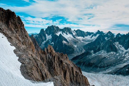Breathtaking winter view of Mont Blanc and rugged peaks in Haute-Savoie, France.