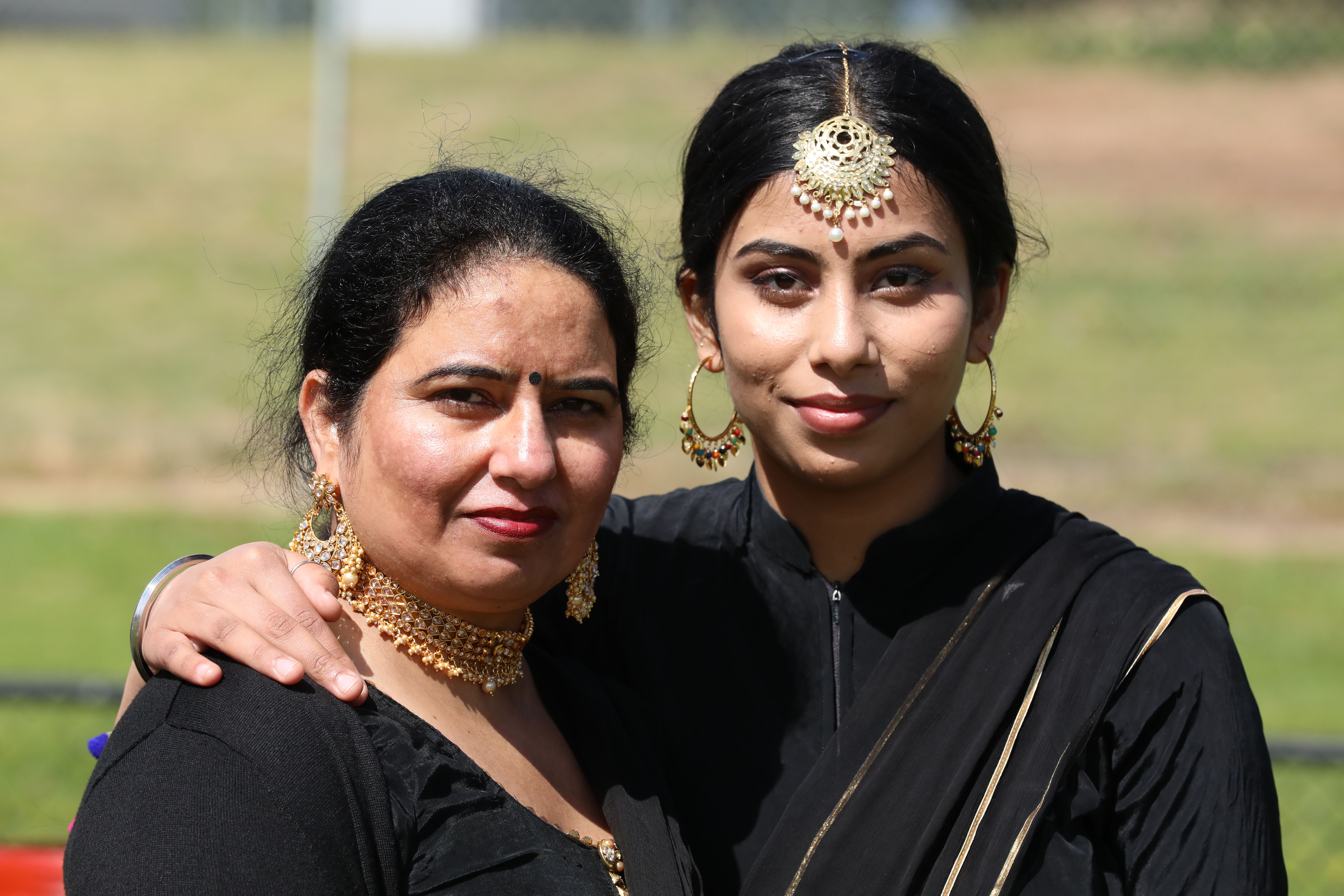 Elegant Portrait of Two Women in Traditional Attire · Free Stock Photo