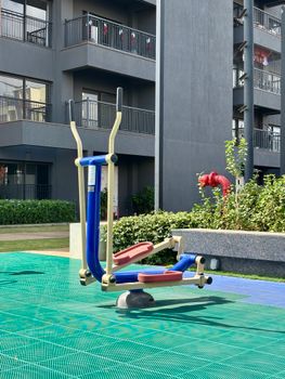 Outdoor fitness equipment in a Bangalore apartment complex, showcasing urban lifestyle.