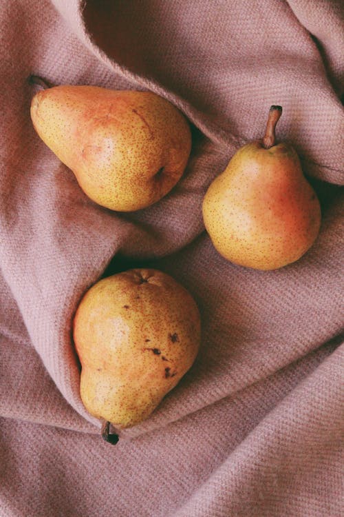 Free Three Pears on Cloth Stock Photo