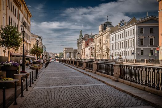Picturesque European street with beautiful historic buildings on a sunny day.