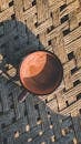 Aerial View of Coffee Mug on Woven Mat