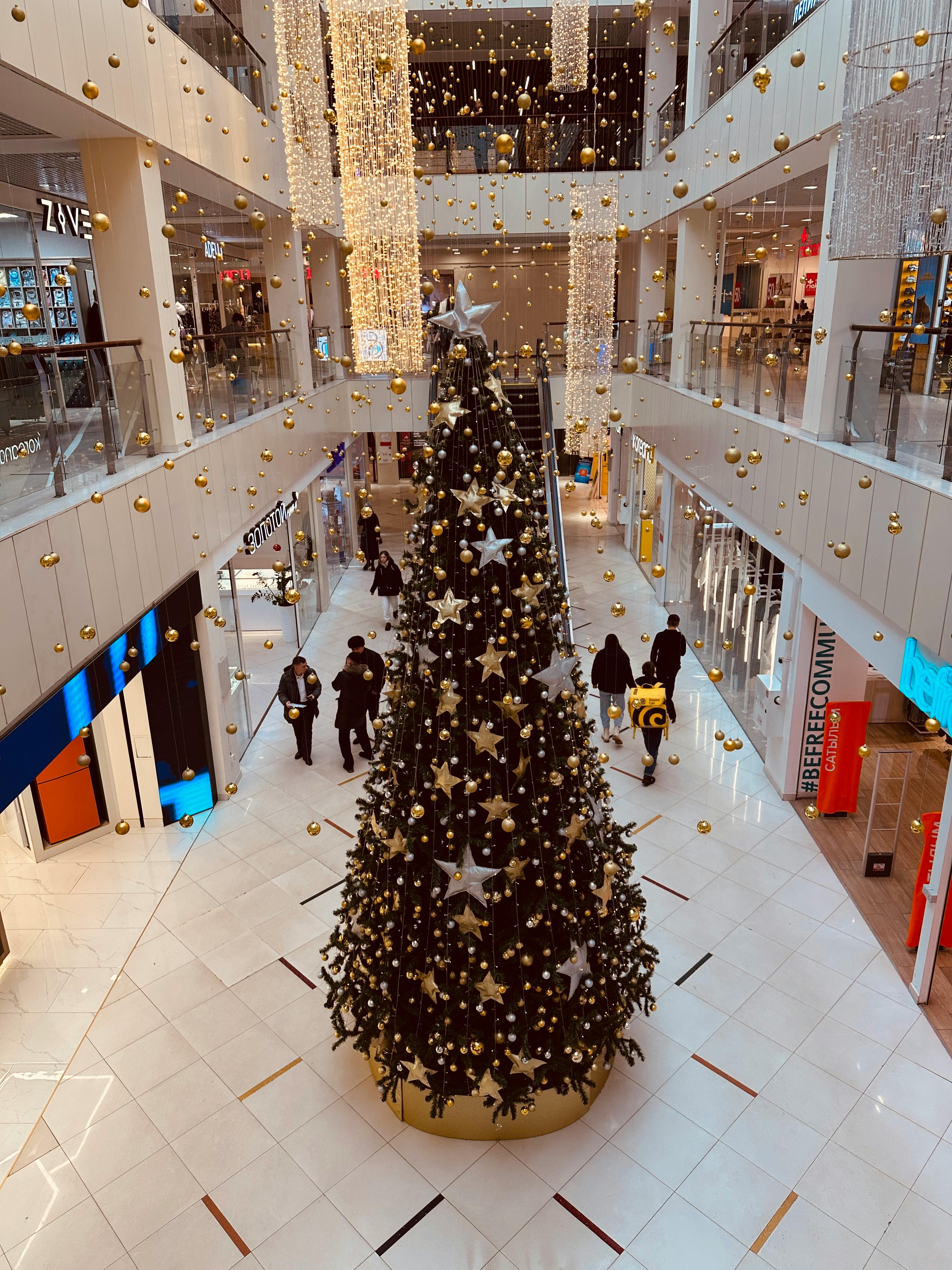 festive shopping mall with christmas tree decor