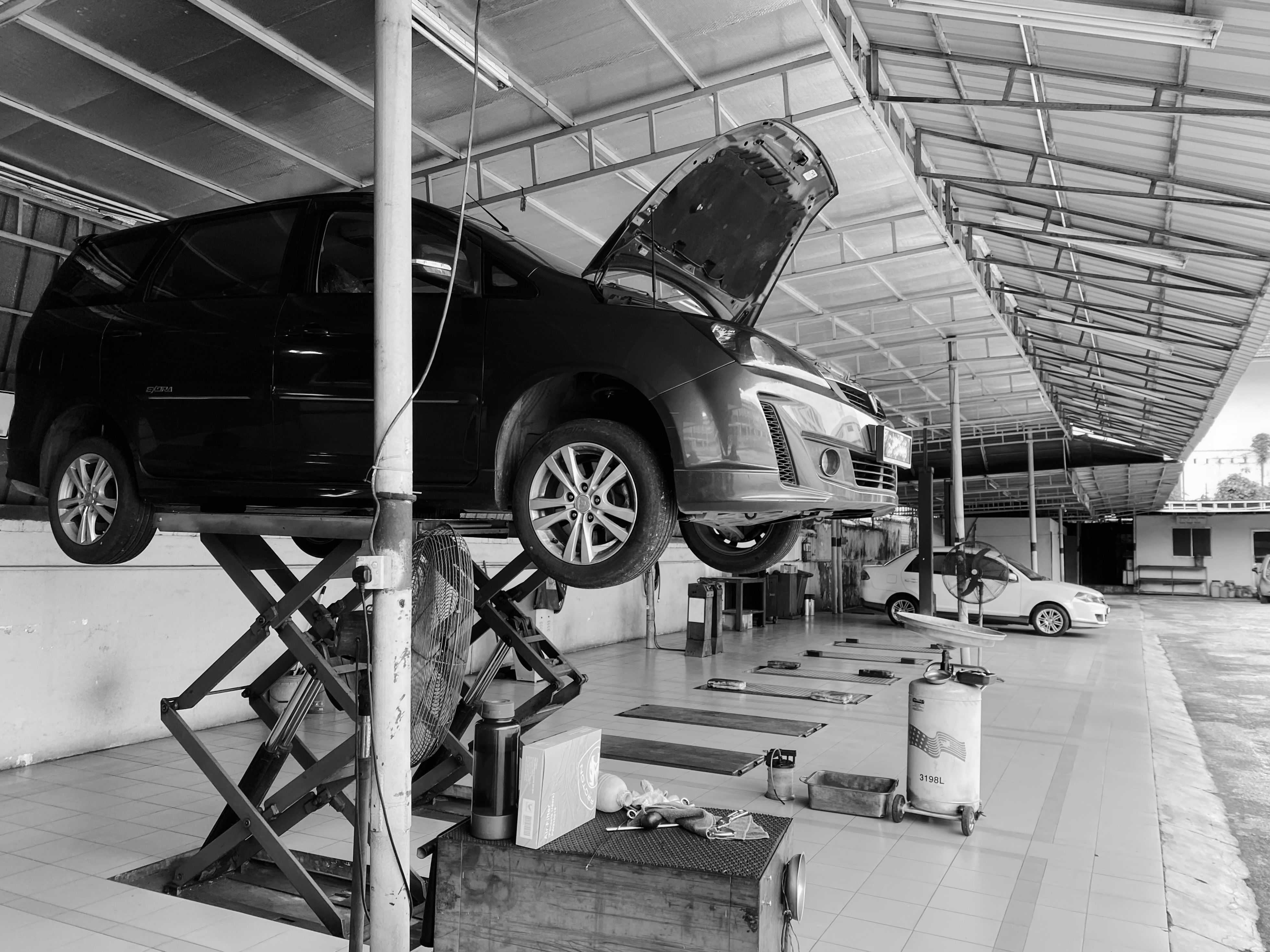 Monochrome Vehicle Maintenance Workshop in Ipoh · Free Stock Photo