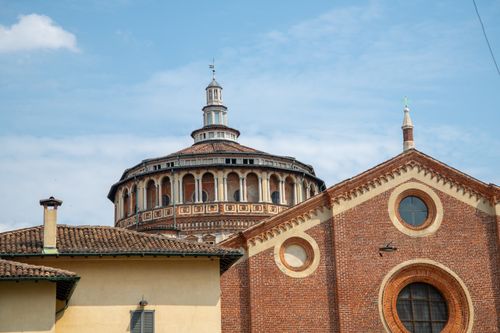 Free View of Santa Maria delle Grazie, a historic church in Milan, Italy, with unique architectural features. Stock Photo