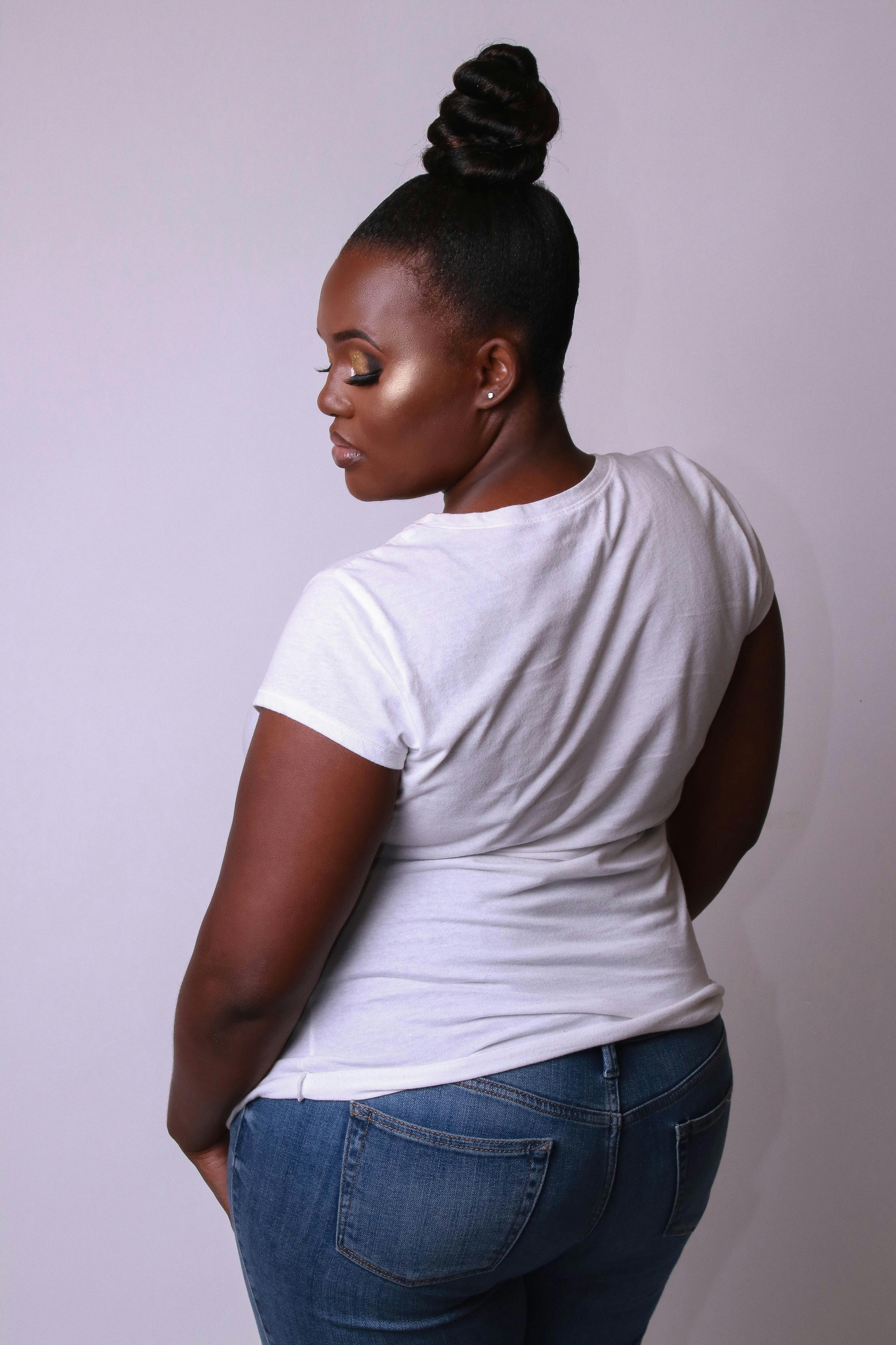 girl in white shirt and blue jeans