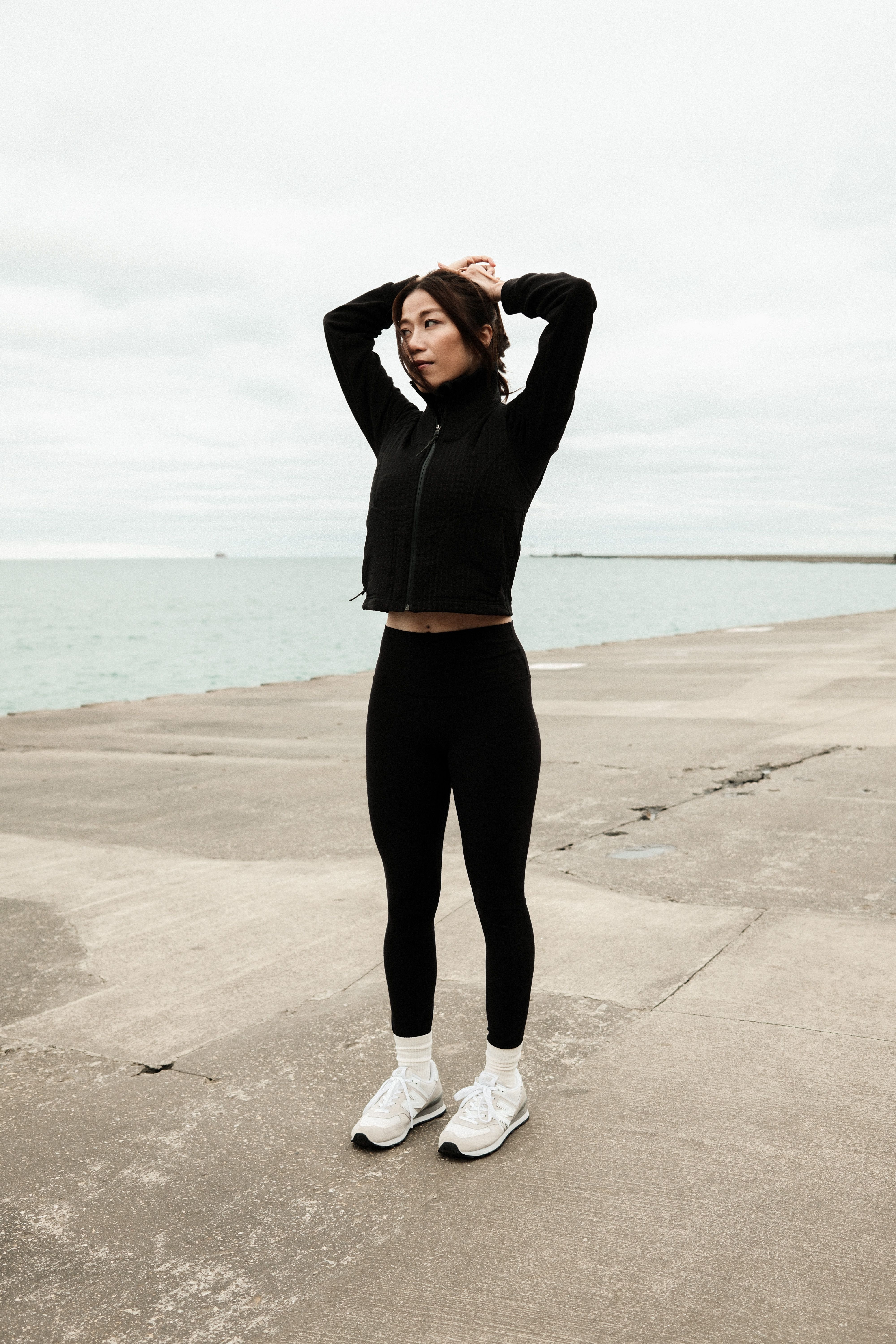 Woman running outdoors wearing leggings