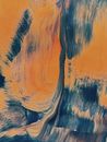 一幅充满活力的抽象画中，动态的橙色与蓝色漩涡交织展现