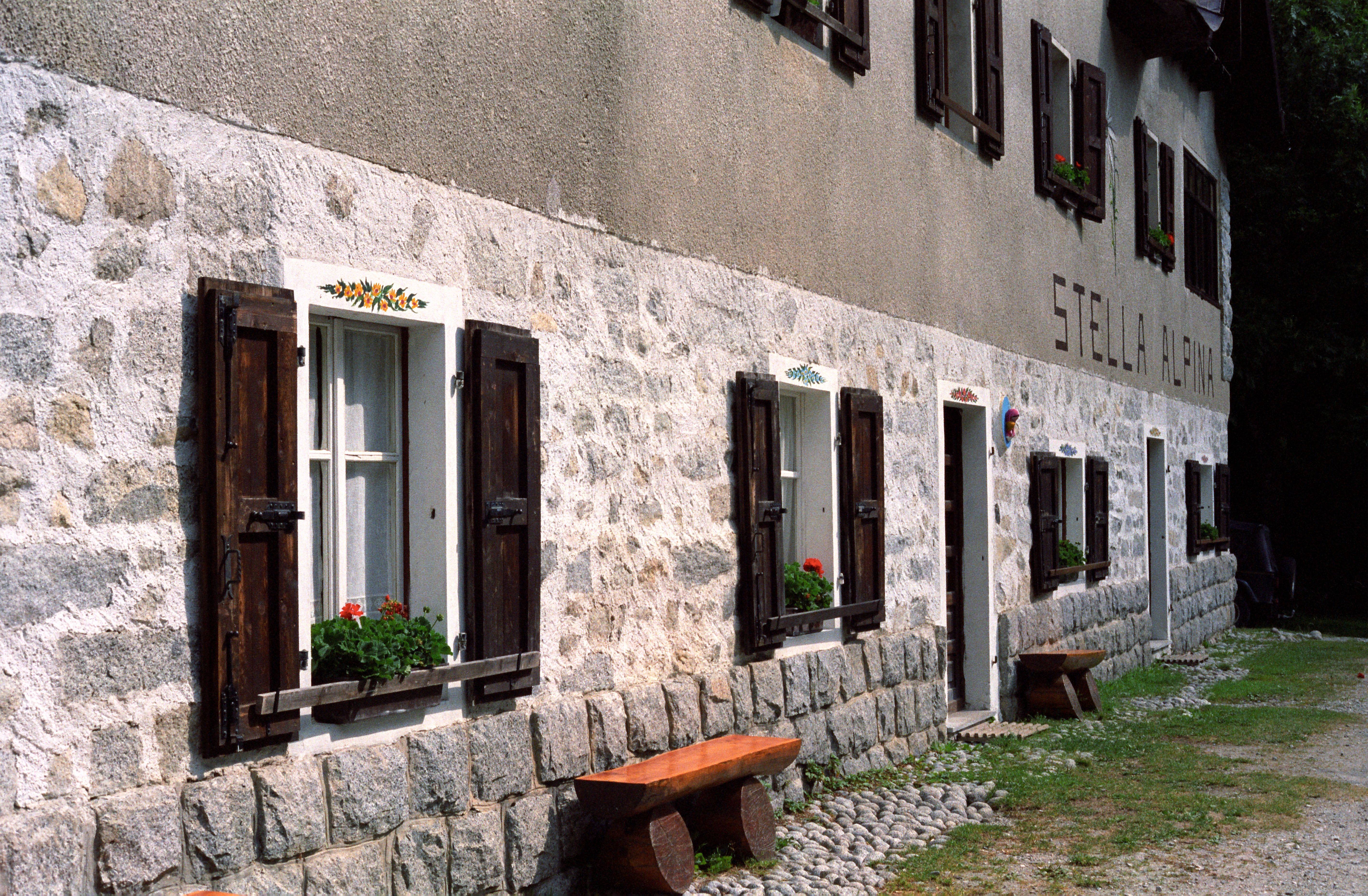 Charming stone village with flower boxes, Triglav National Park Slovenia