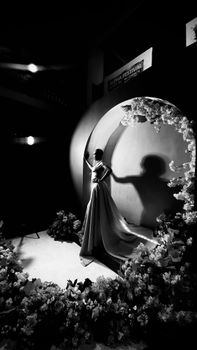 Graceful black and white fashion shot at Abuja Film Festival.