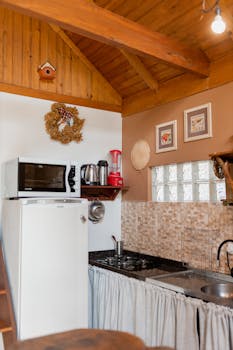Charming rustic kitchen with wooden accents, modern appliances, and a warm atmosphere.