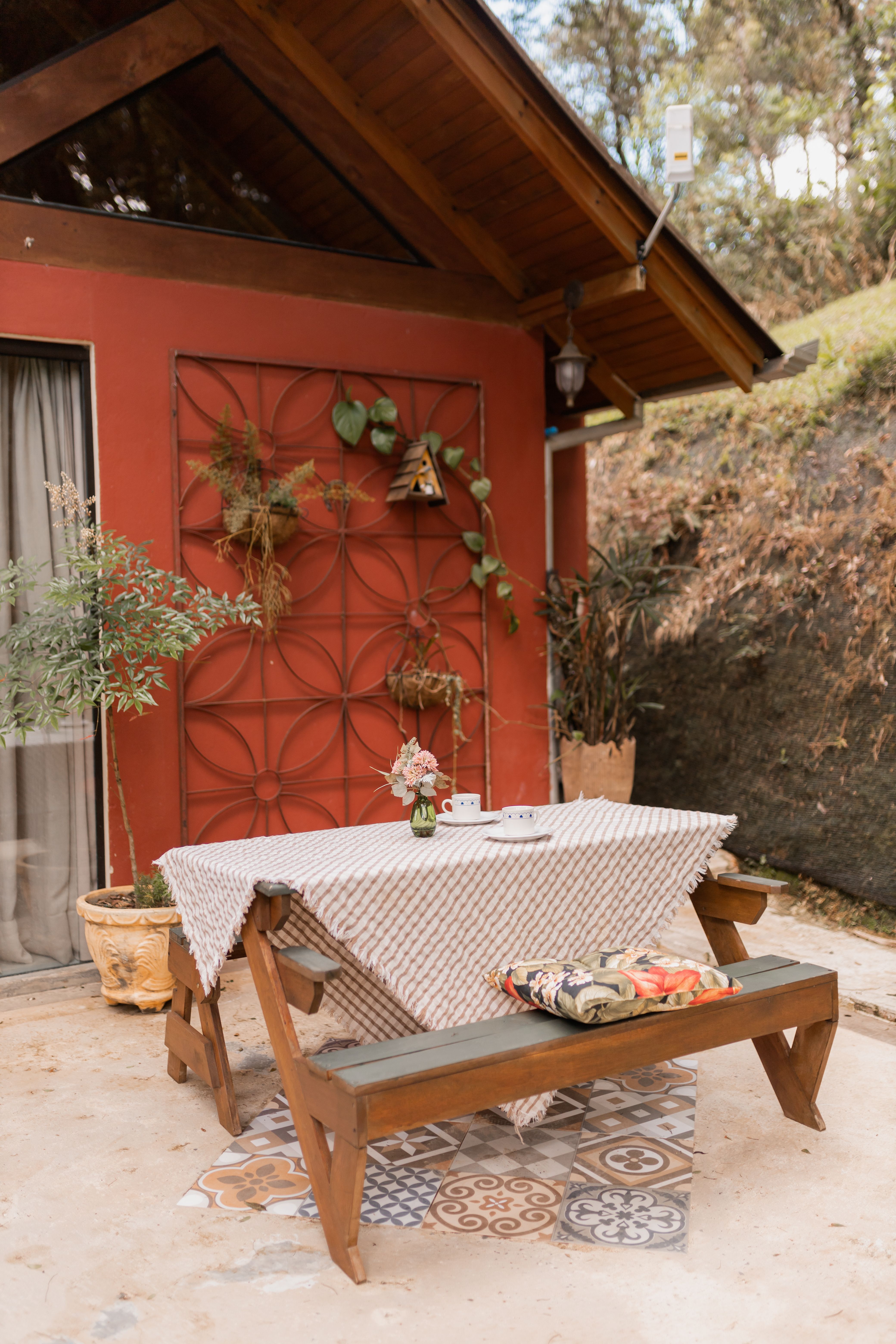 Charming Outdoor Patio with Table and Plants · Free Stock Photo