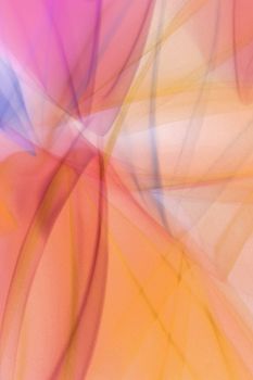 Vibrant abstract design with flowing colorful light trails in warm hues.