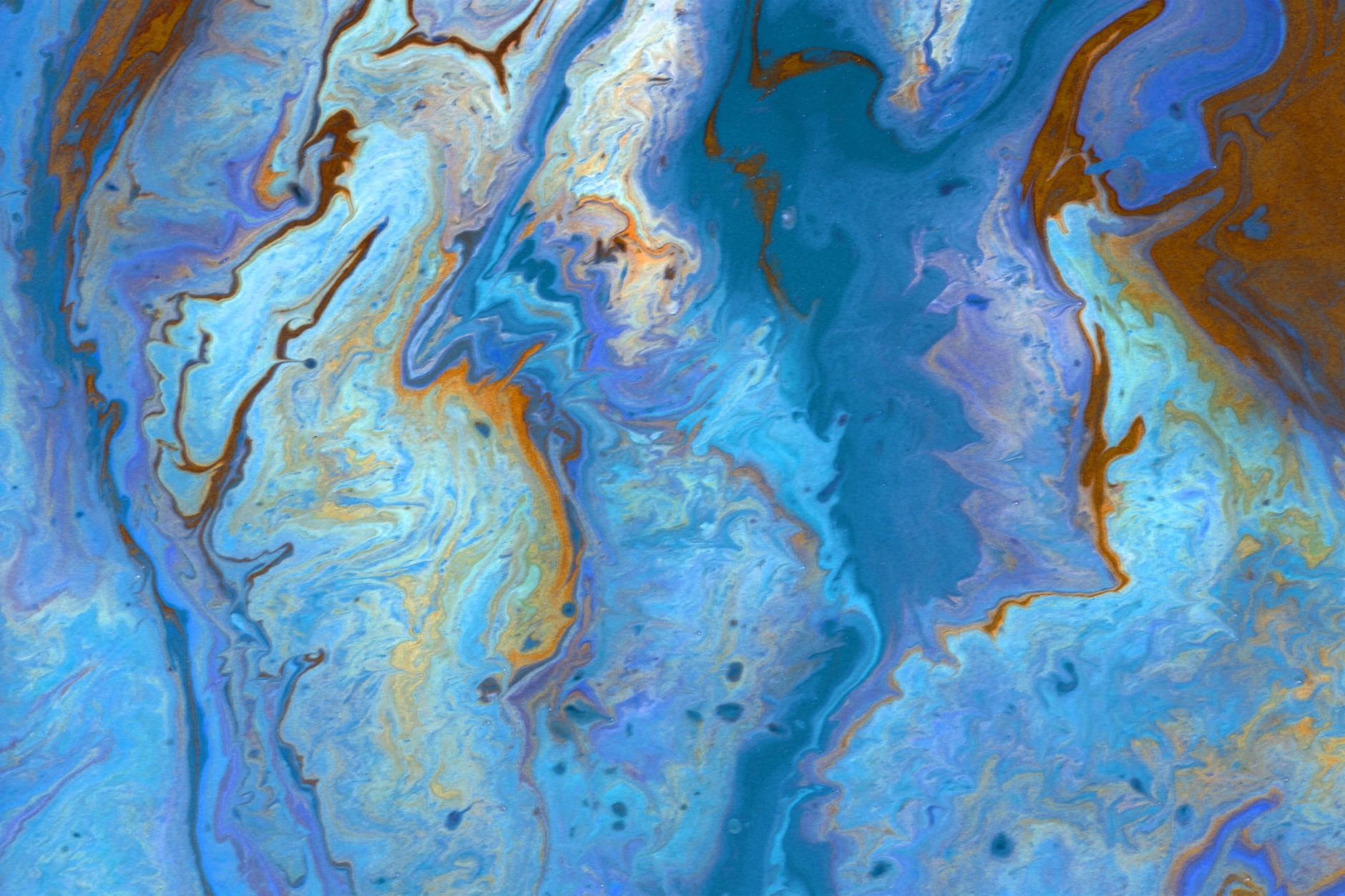 Dynamic abstract art with blue and orange fluid patterns creating a mesmerizing effect.