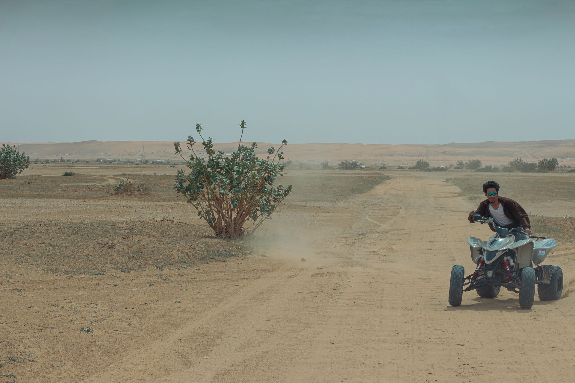 A thrilling ATV ride in the vast desert landscape of Riyadh, Saudi Arabia.