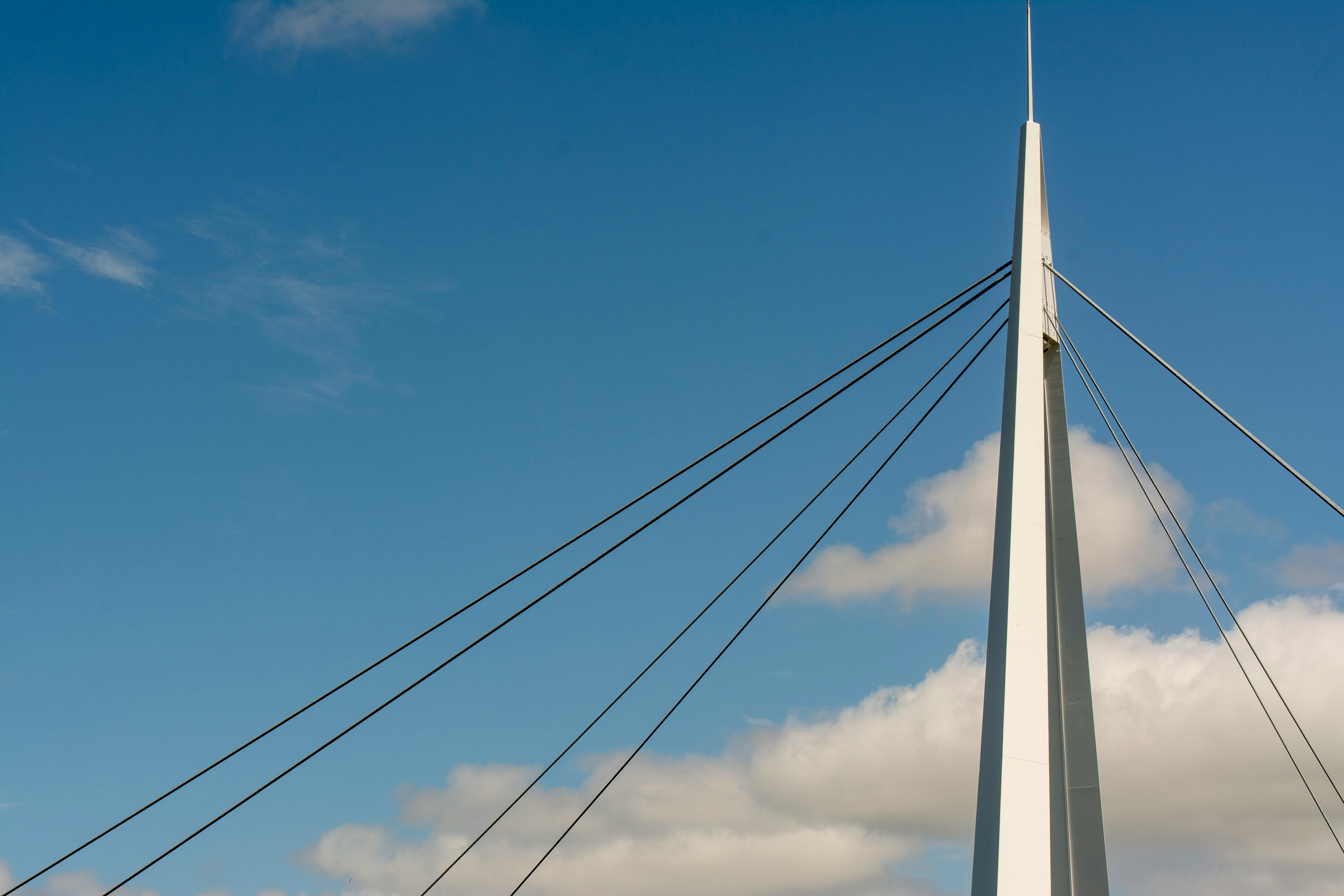 Close-up of a modern cable-stayed bridge in Le Havre, France, highlighting elegant design and architecture.