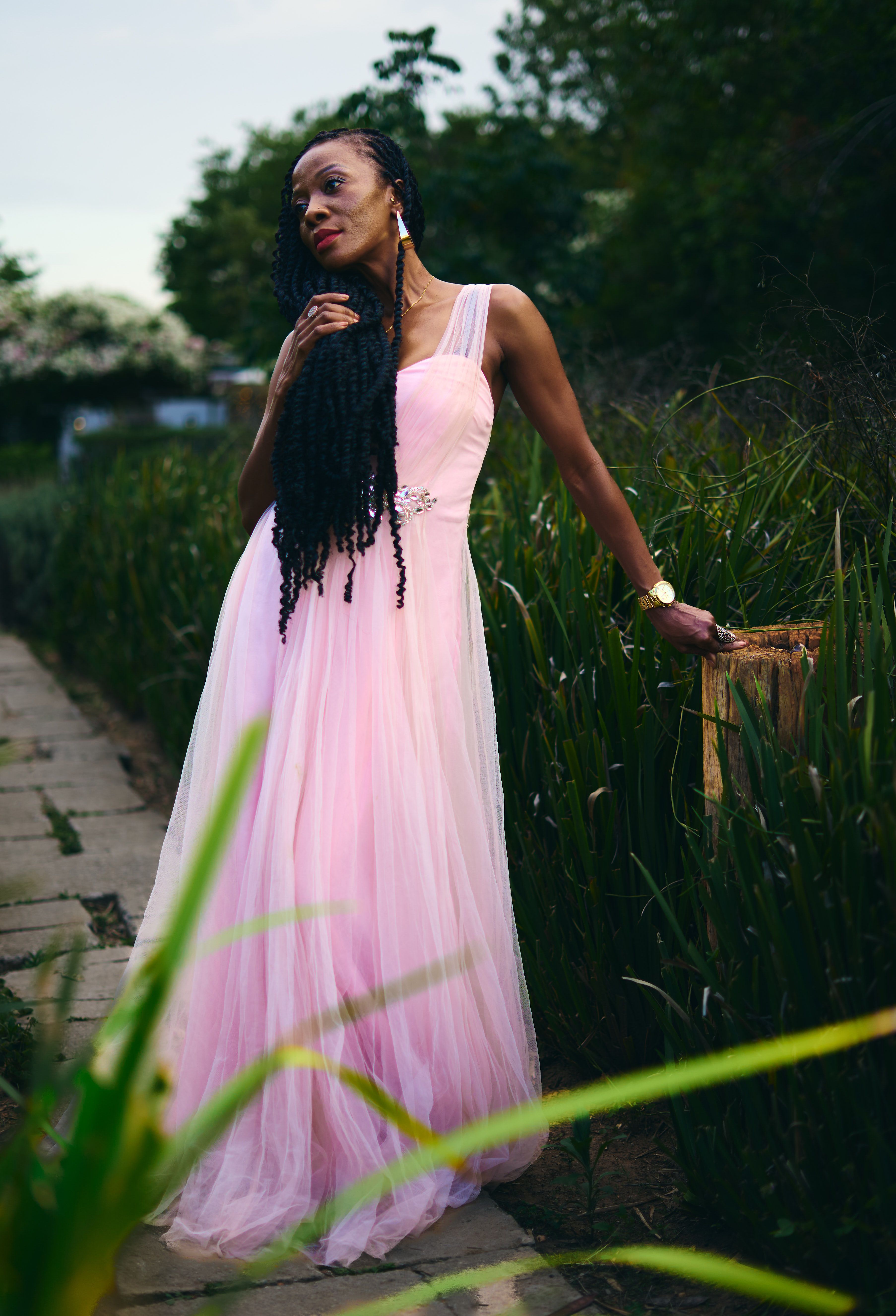 Elegant Woman in Pink Dress Outdoors · Free Stock Photo