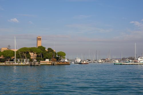 Free Scenic view of Venice marina featuring historic architecture and calm waters under a clear sky. Stock Photo