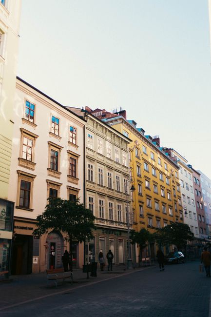 Explore the colorful architecture of Brno's historic streets in Czechia, showcasing timeless beauty.