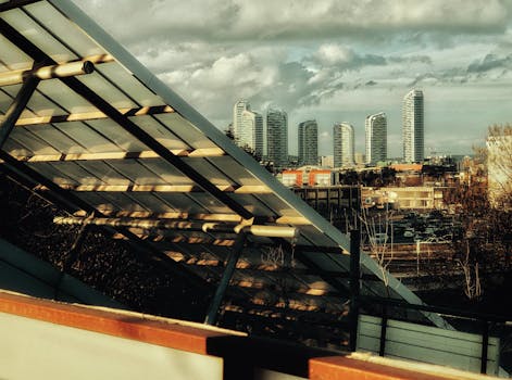 Dramatic cityscape with contemporary buildings and urban architectural elements.