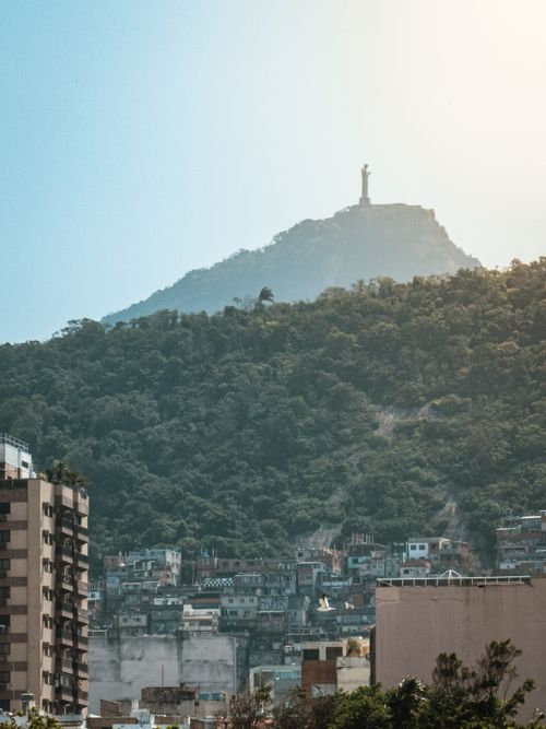 Free Stunning view of the Rio de Janeiro skyline with the iconic Christ the Redeemer statue atop Corcovado Mountain. Stock Photo