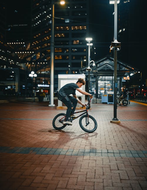 Free Photo Of Man Riding Bicycle Stock Photo
