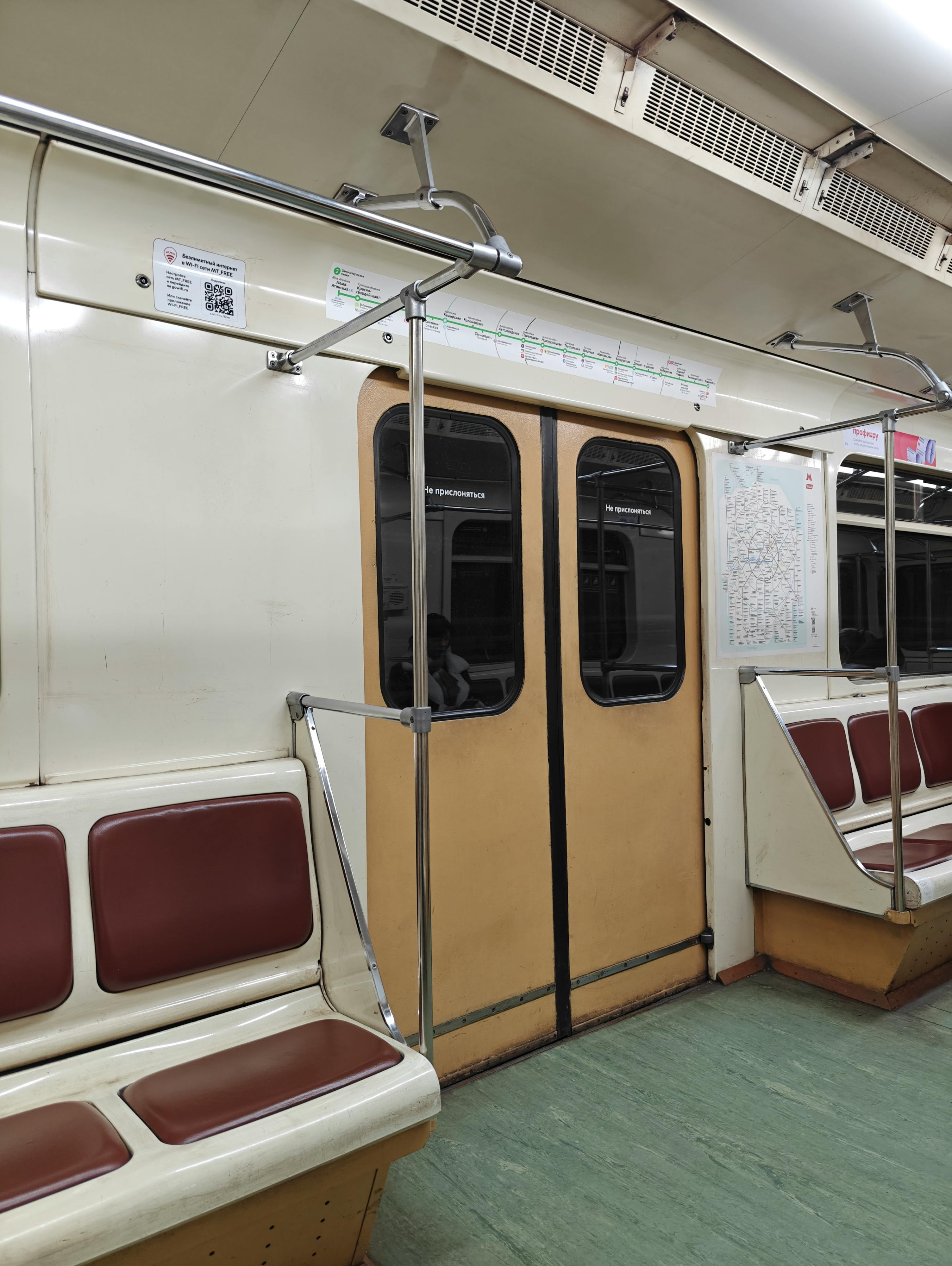 empty subway train interior with vintage seats
