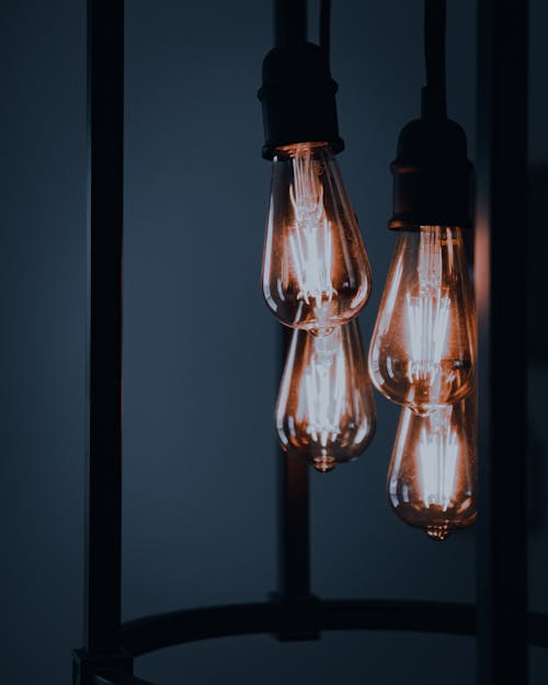 Four Light Bulbs in Close-Up Photography