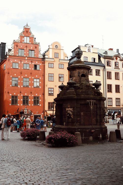 Free Historic architecture and lively street scene in Stockholm's Old Town, Gamla Stan. Stock Photo