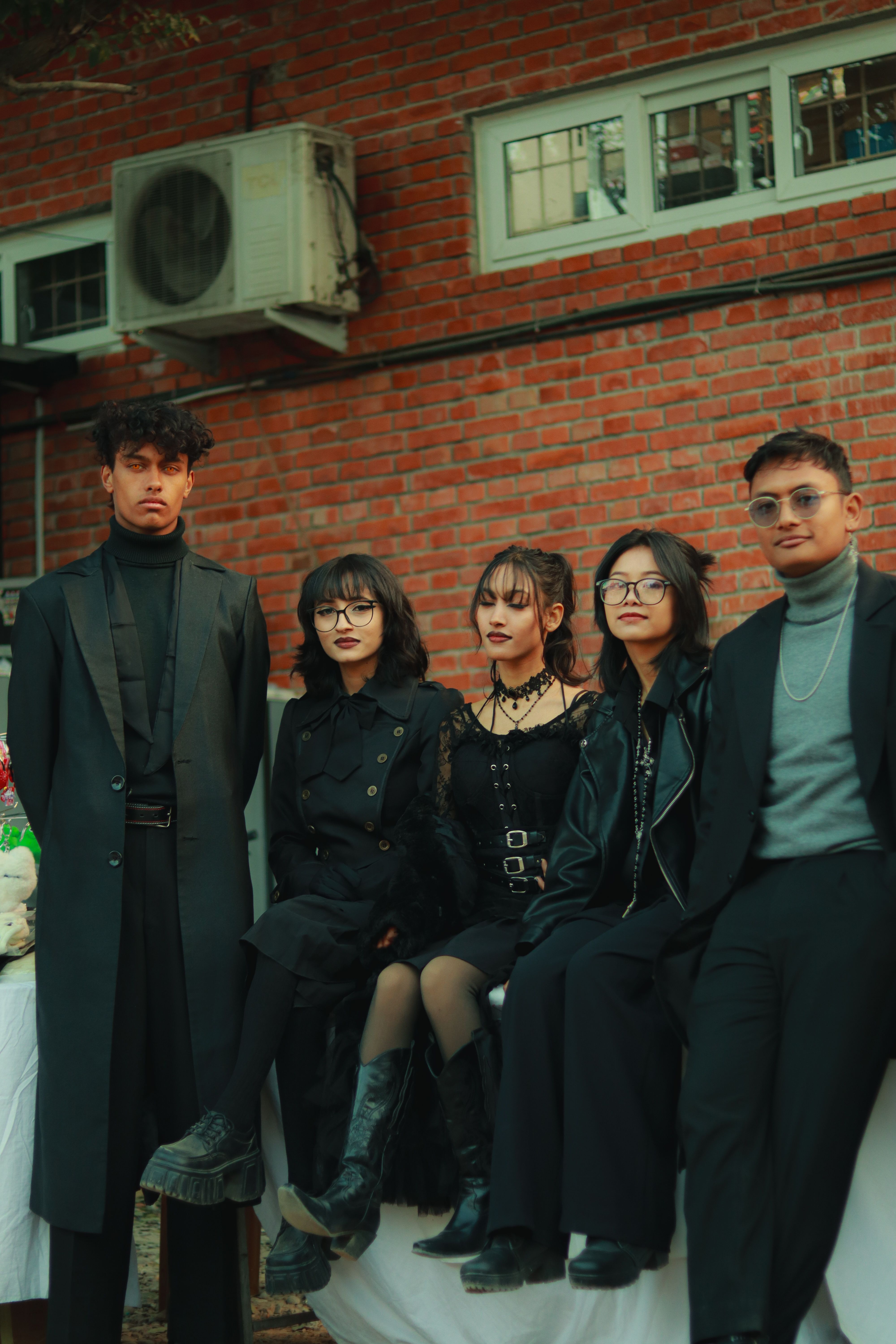 Stylish Group Portrait in Urban Outdoor Setting · Free Stock Photo