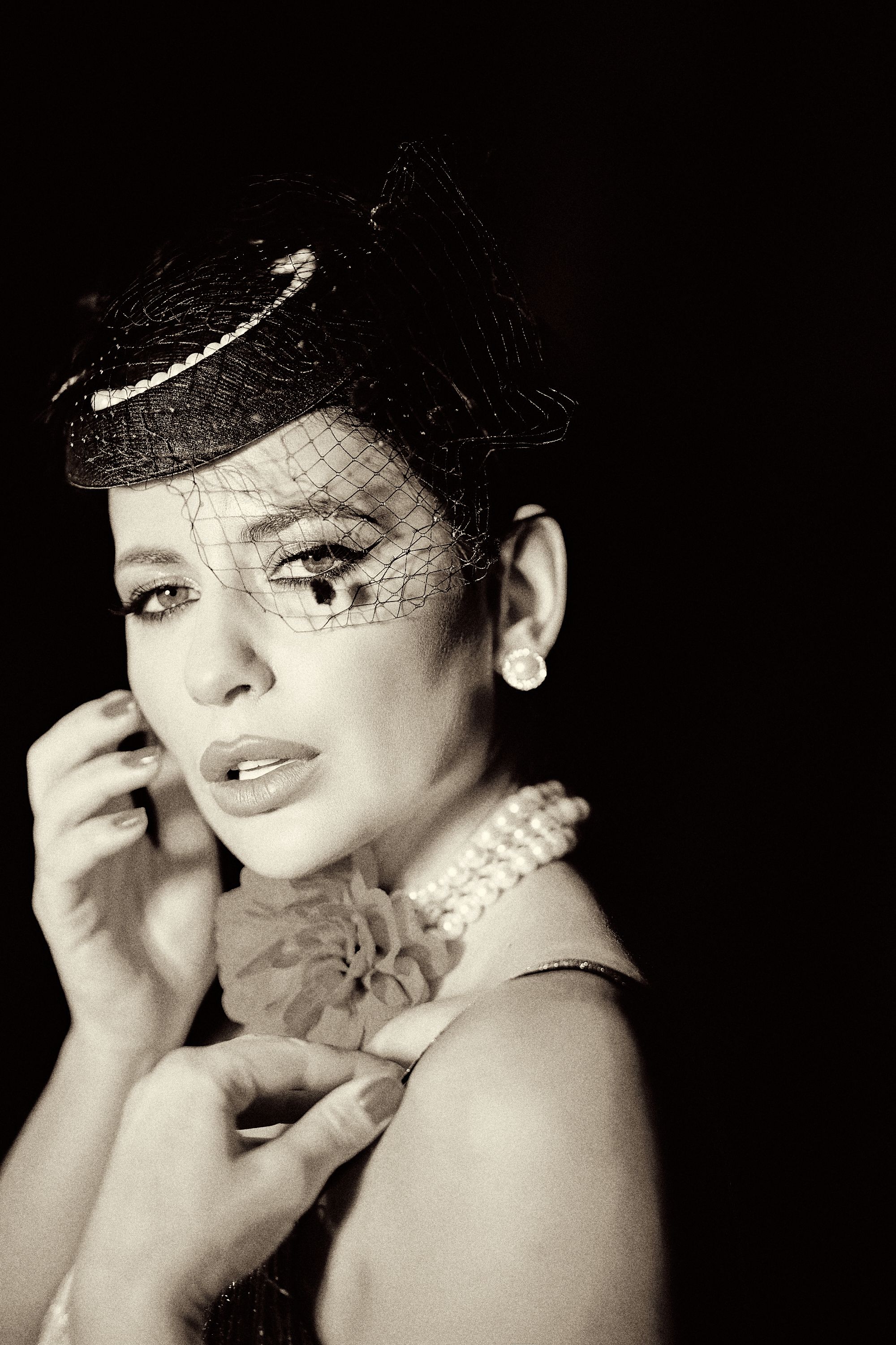 Elegant Vintage Portrait of Woman with Fascinator · Free Stock Photo