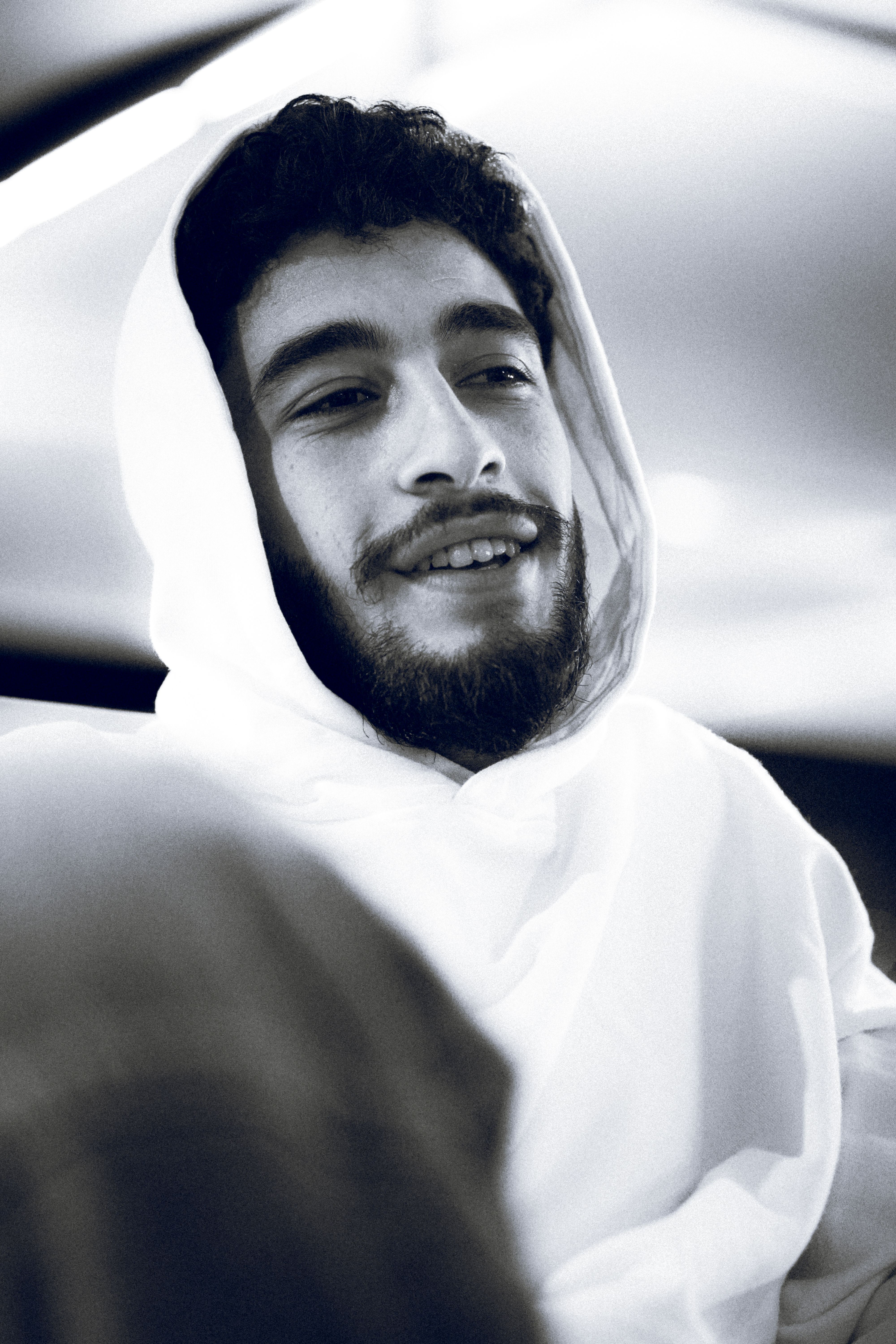 Monochrome Portrait of Bearded Man in Hoodie · Free Stock Photo