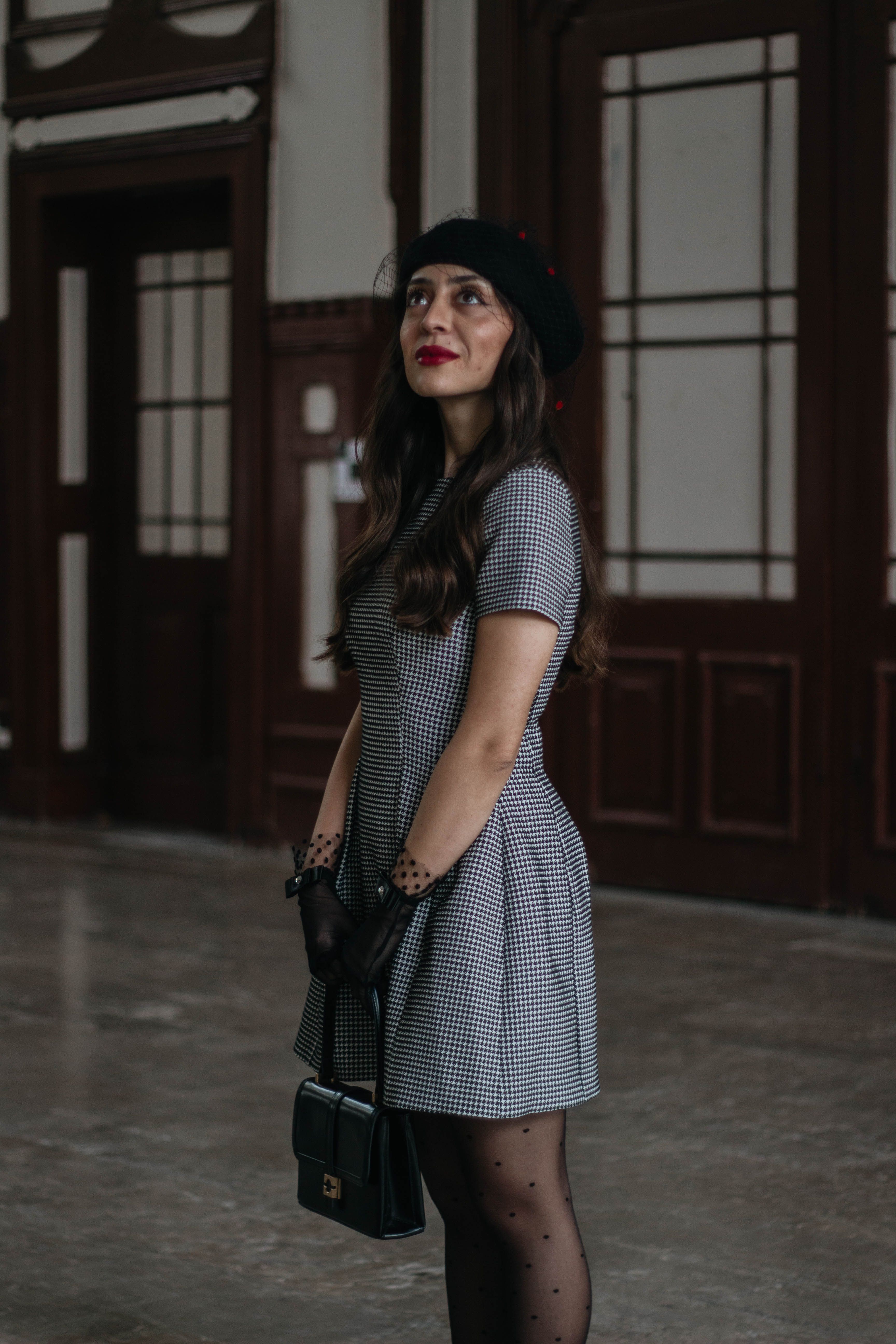 Elegant Woman in Vintage Outfit Indoors · Free Stock Photo