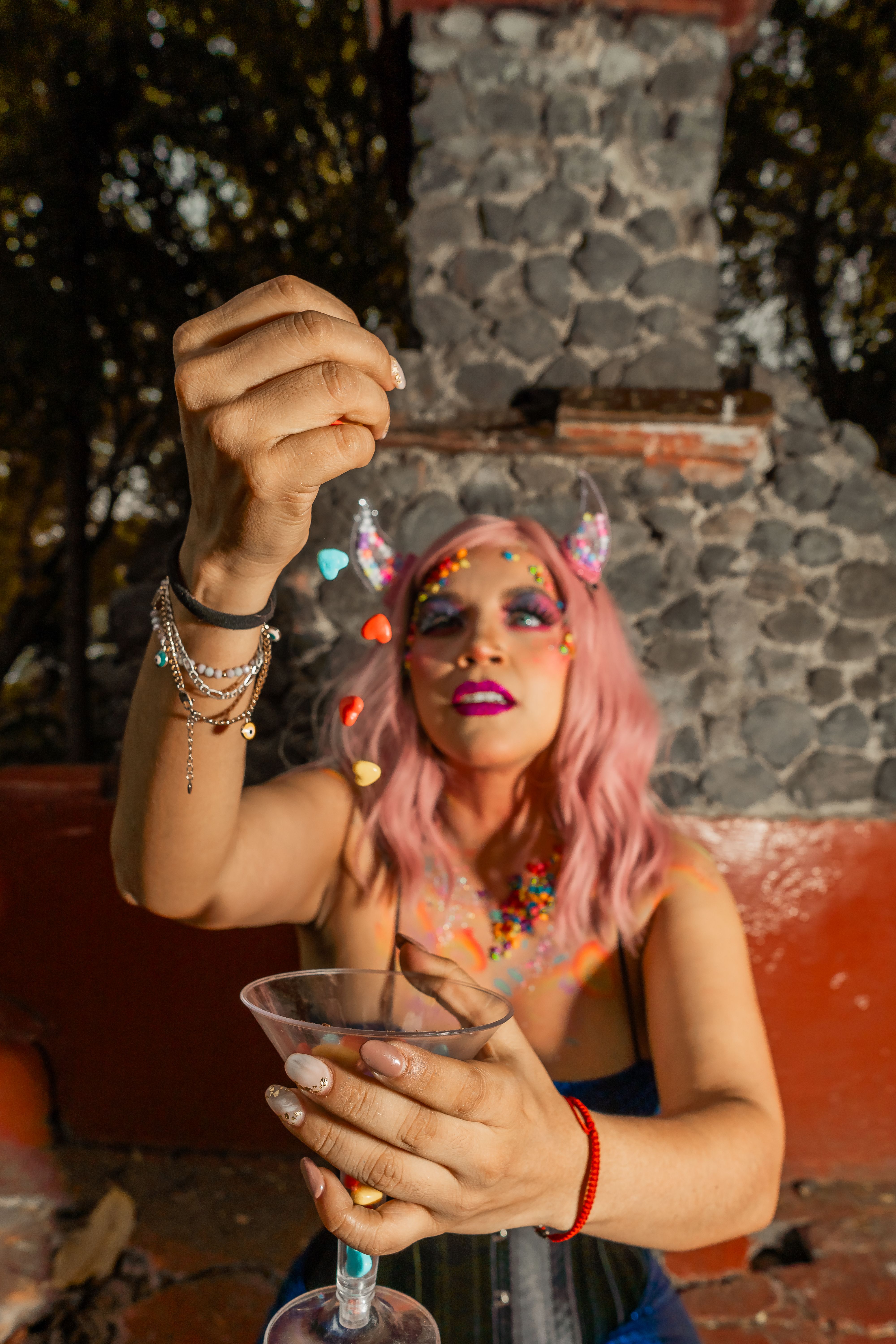 A vibrant surreal portrait featuring a woman with fantasy makeup and colorful accents, set in Ciudad de México.