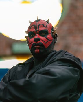 Intricate cosplay of a Sith Lord captured at a convention in San José, Costa Rica.