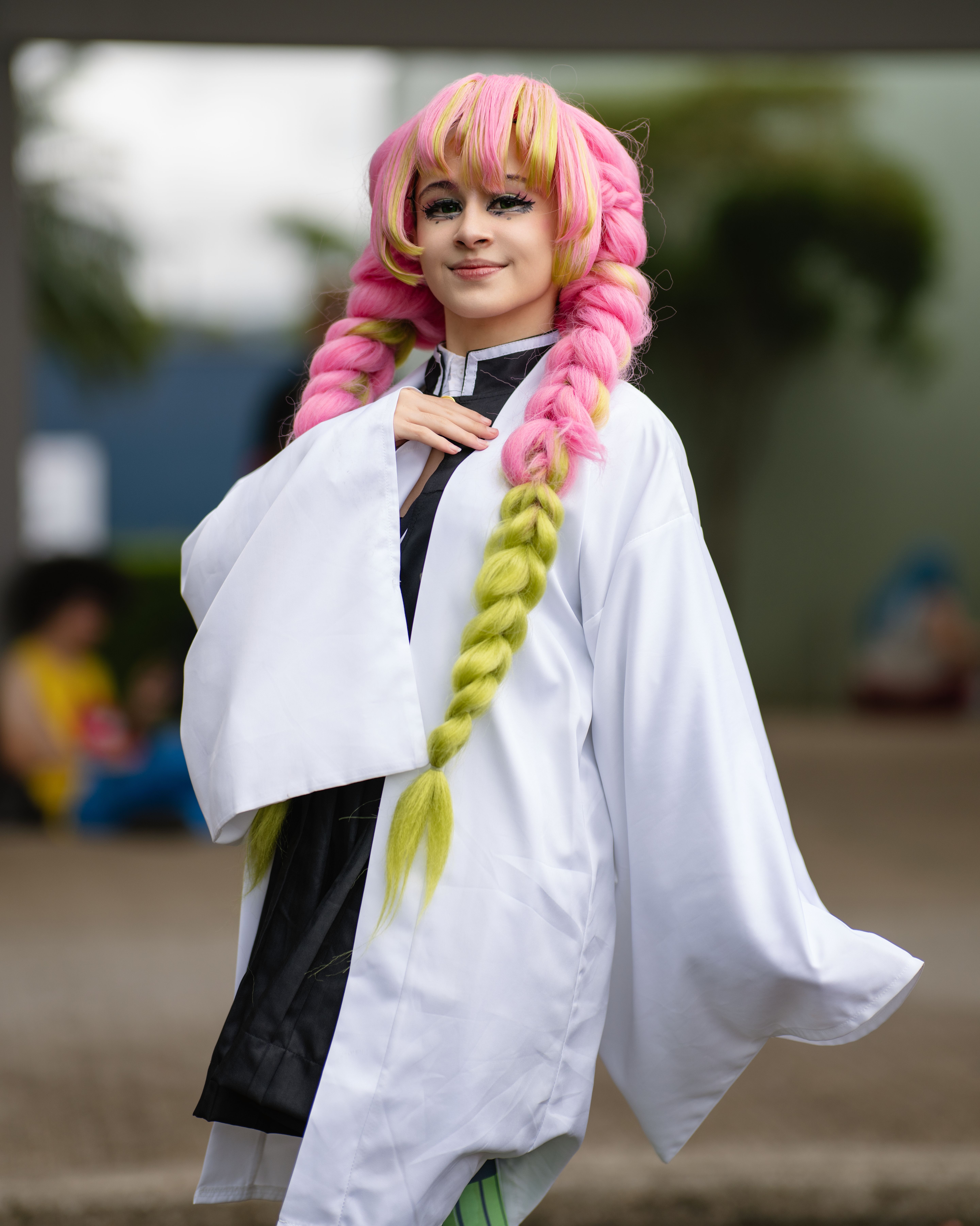 Vibrant anime cosplay character posing outdoors in San José, Costa Rica.
